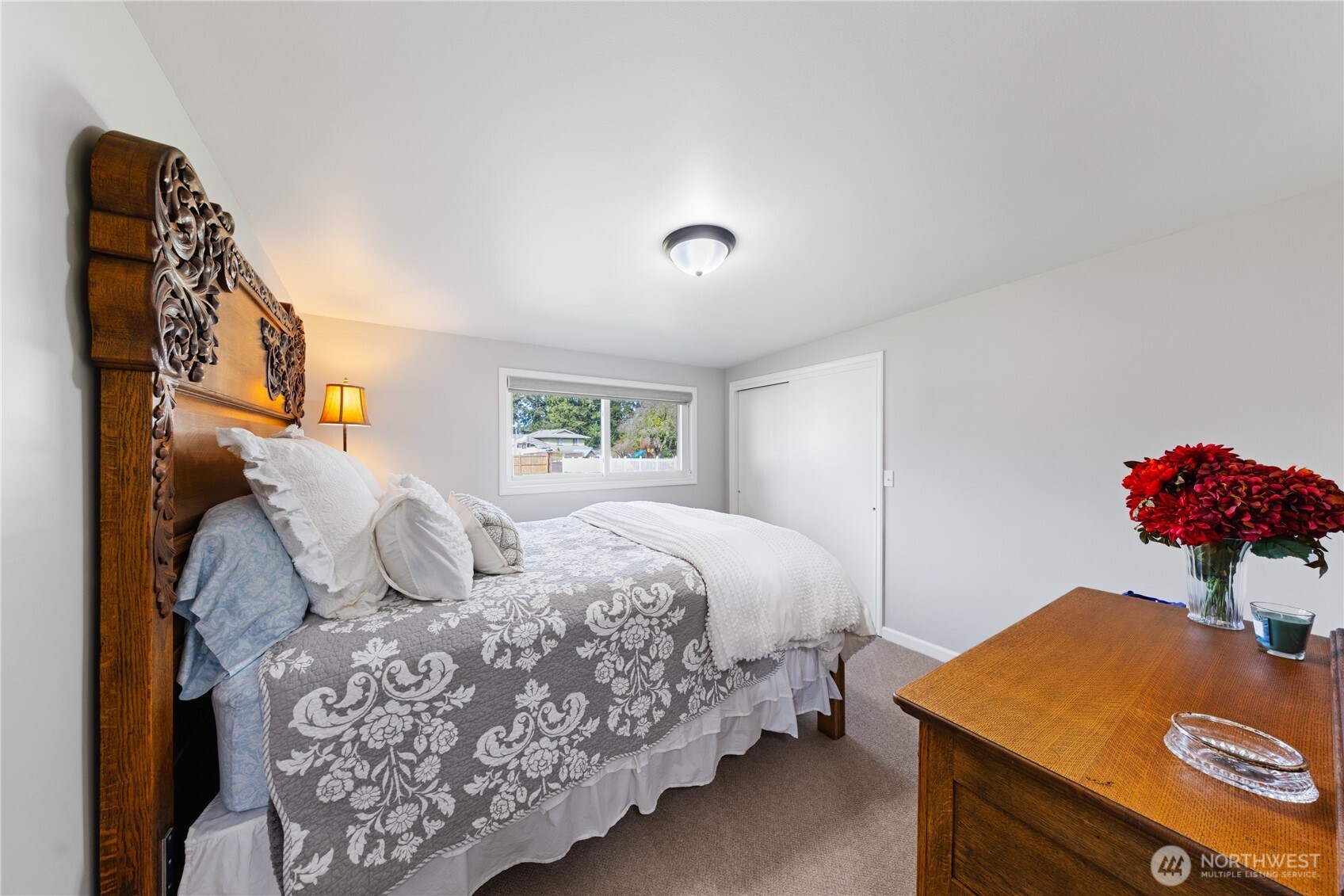 802 Haddon Road Anacortes, WA 98221 - Photo 26 of 36 a bedroom with bed and a window