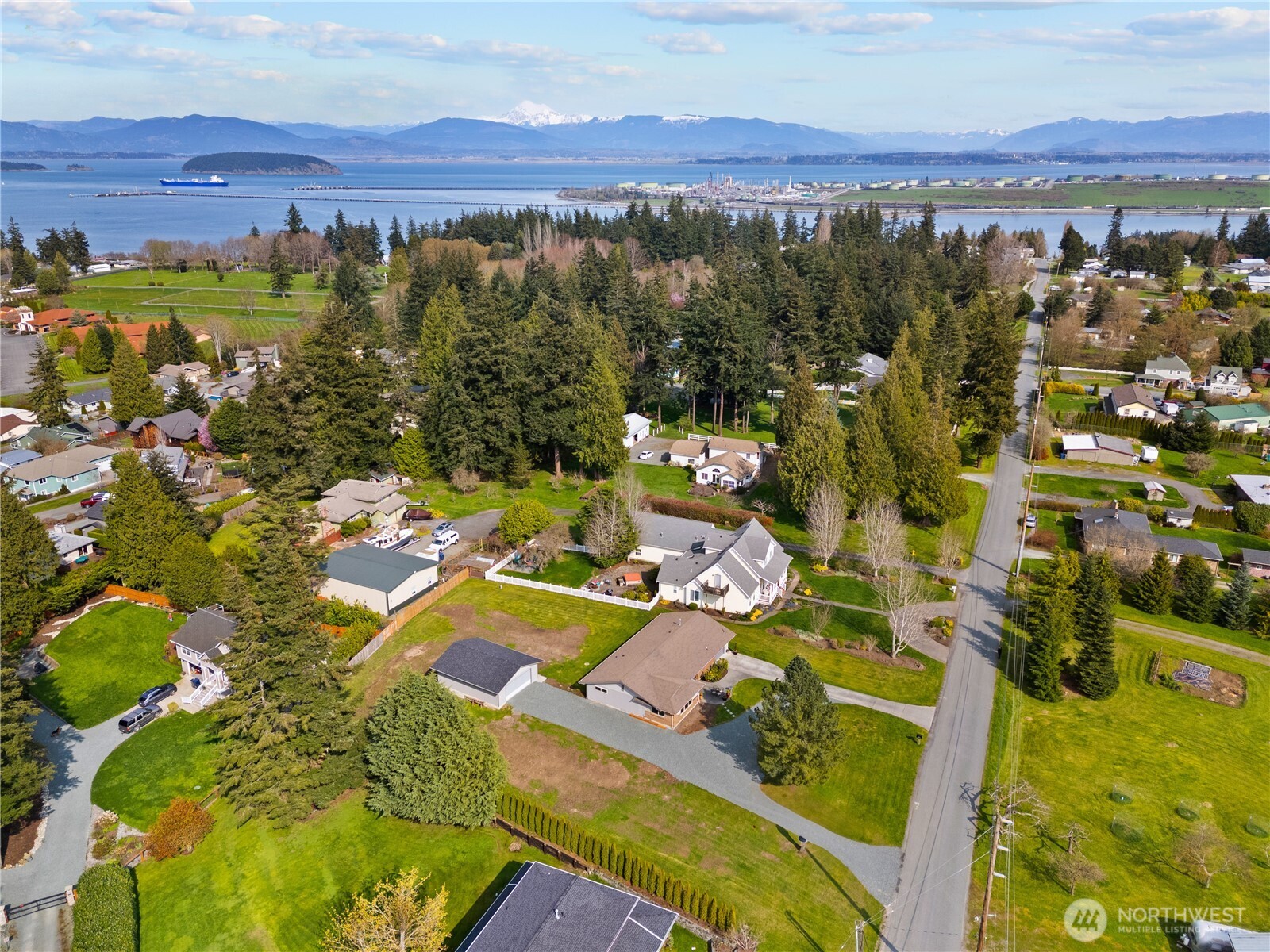 802 Haddon Road Anacortes, WA 98221 - Photo 36 of 36 a view of a city with mountains in the background