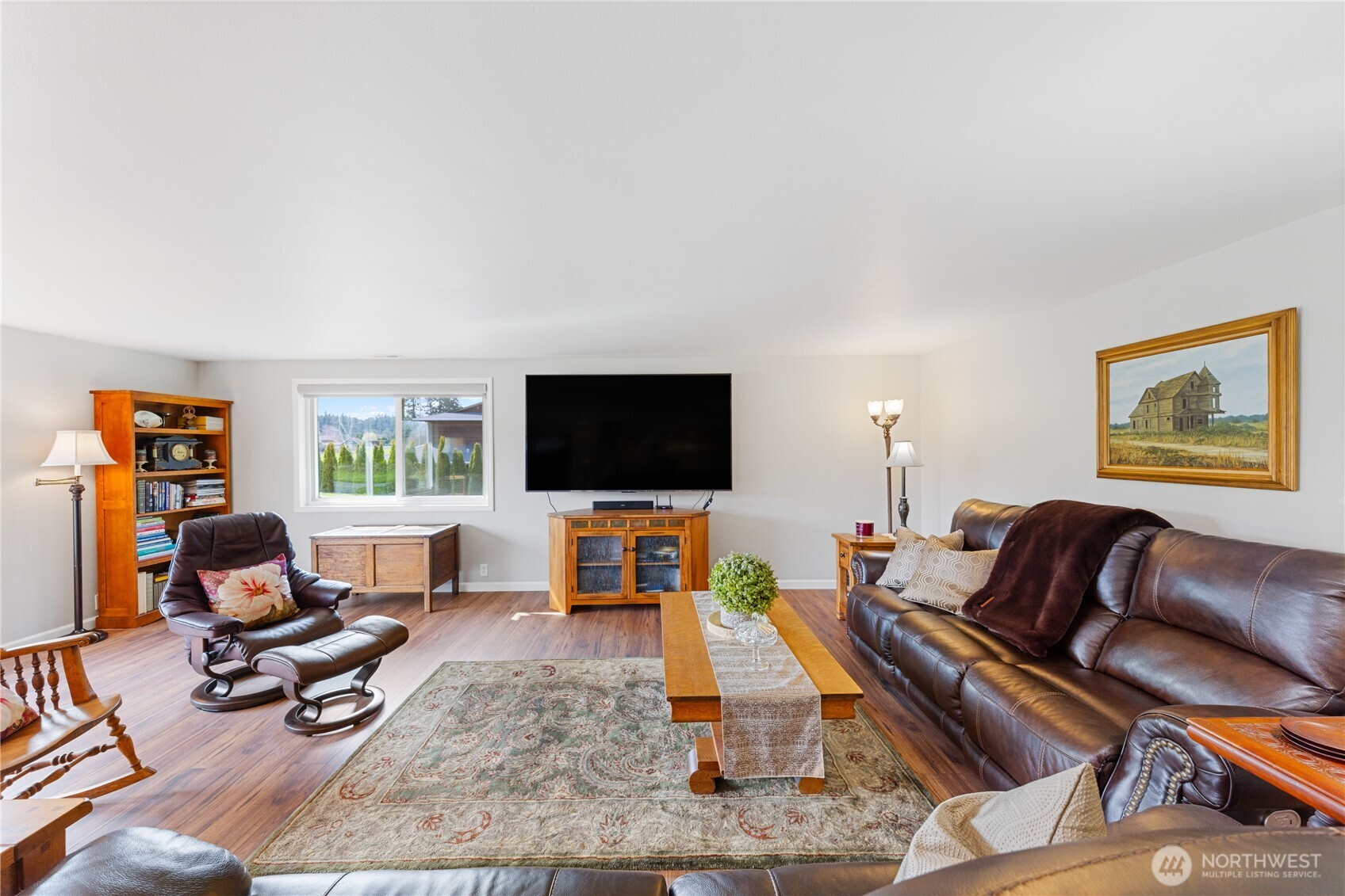 802 Haddon Road Anacortes, WA 98221 - Photo 5 of 36 a living room with furniture and a flat screen tv