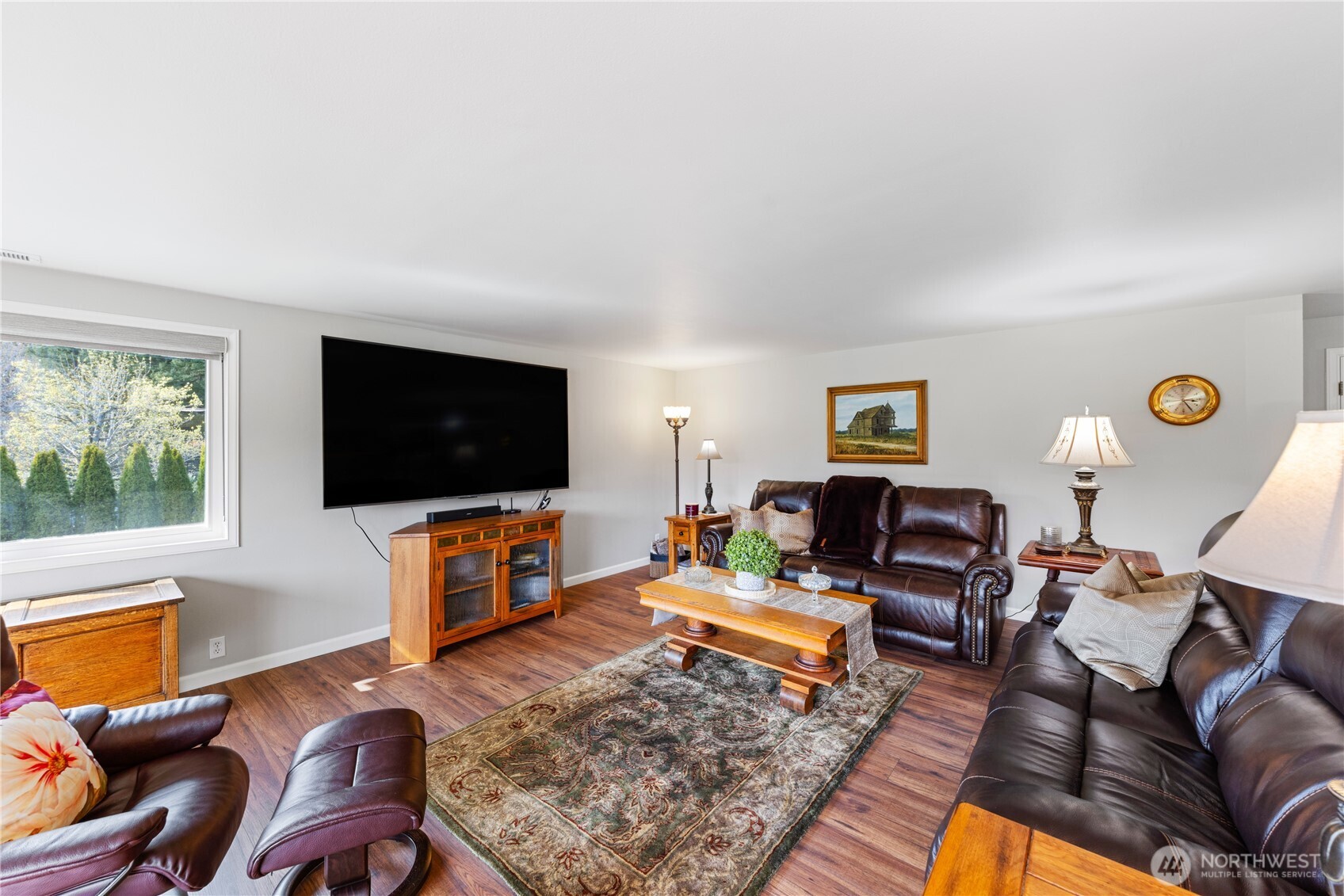 802 Haddon Road Anacortes, WA 98221 - Photo 7 of 36 a living room with furniture and a flat screen tv