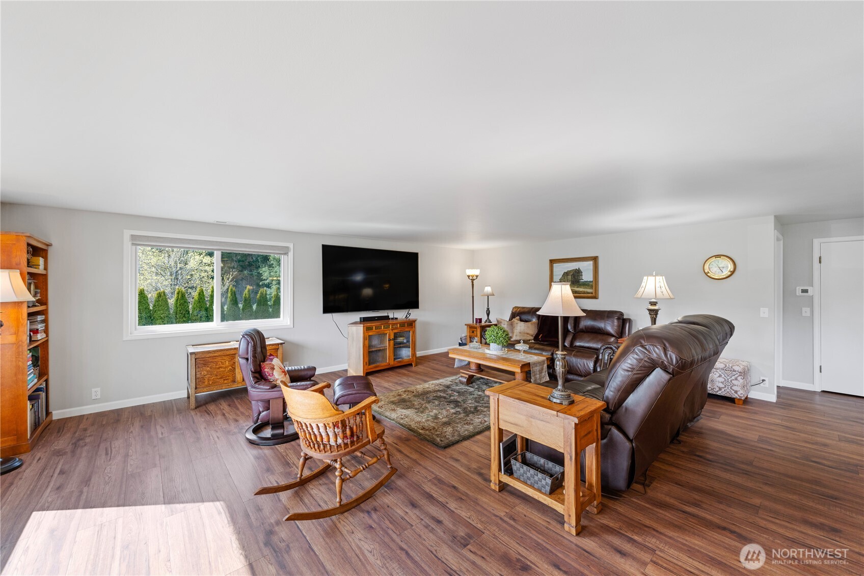 802 Haddon Road Anacortes, WA 98221 - Photo 8 of 36 a living room with furniture and a flat screen tv
