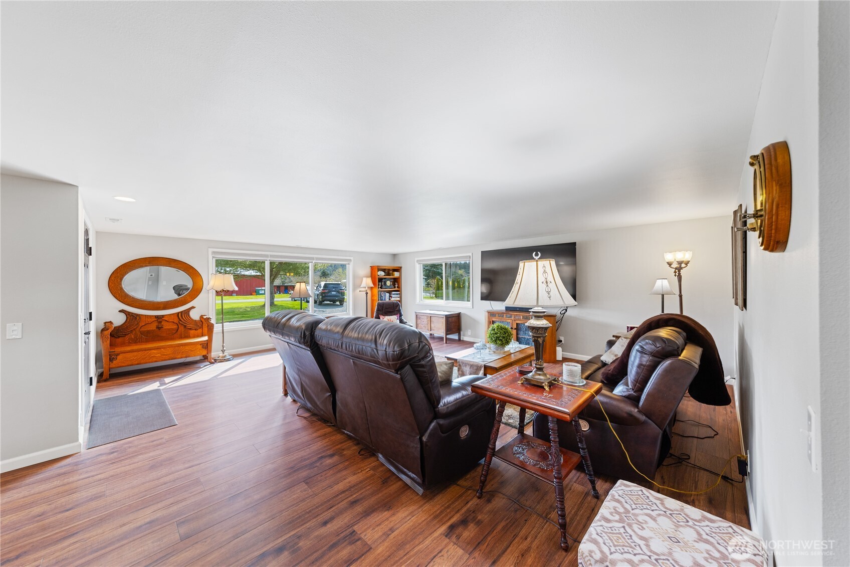 802 Haddon Road Anacortes, WA 98221 - Photo 9 of 36 a living room with furniture and a wooden floor