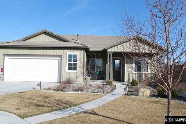 10680 Eagle Falls Way Reno, NV 89521 - Photo 1 of 8 a front view of a house with garden