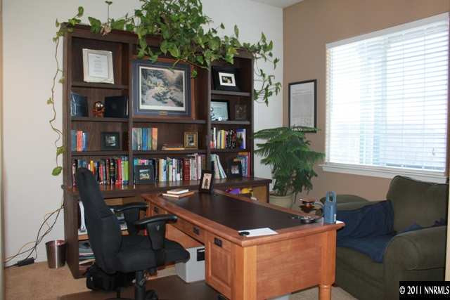 10680 Eagle Falls Way Reno, NV 89521 - Photo 6 of 8 a view of a workspace with furniture and a window