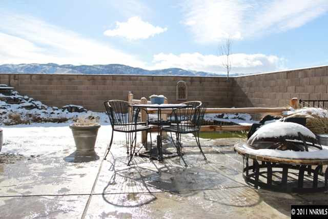 10680 Eagle Falls Way Reno, NV 89521 - Photo 8 of 8 a table and chairs sitting on a patio