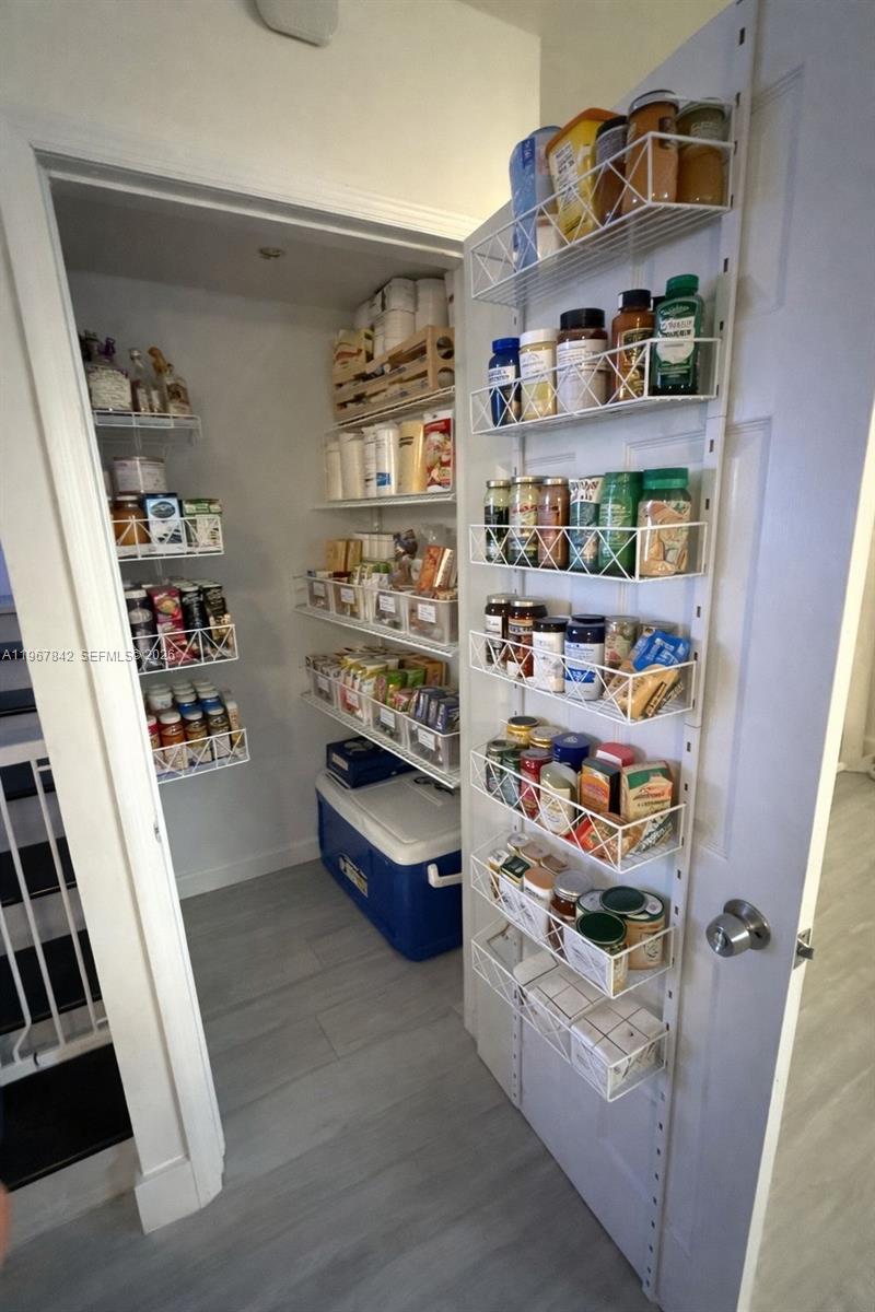 283 Woodland Road, Unit 283 Palm Springs, FL 33461 - Photo 11 of 28 a room with storage and utility