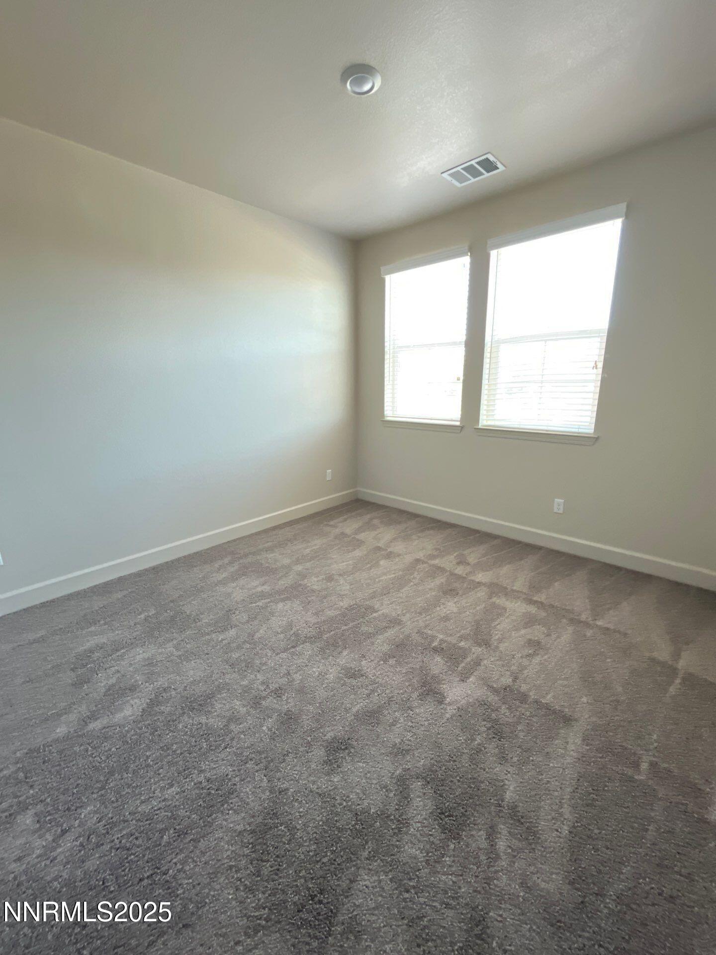 1982 Maradona Drive Sparks, NV 89436 - Photo 12 of 20 an empty room with a window
