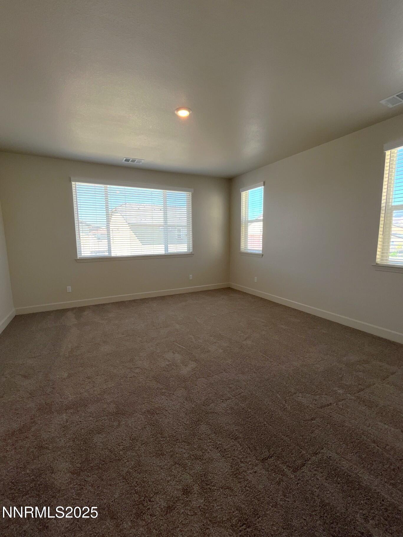 1982 Maradona Drive Sparks, NV 89436 - Photo 6 of 20 an empty room with a window
