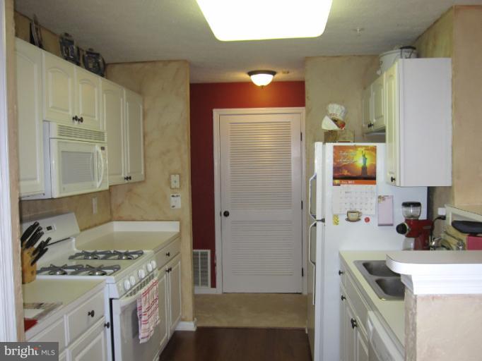 4723 Shellbark Road, Unit 4723 Owings Mills, MD 21117 - Photo 15 of 30 View from Hall into Kitchen