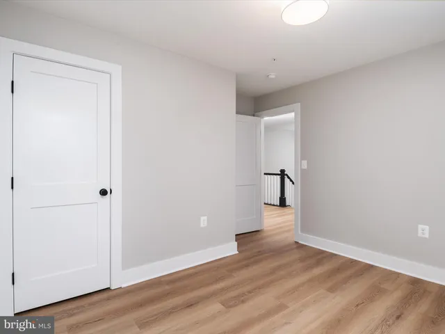 a view of wooden floor and staircase