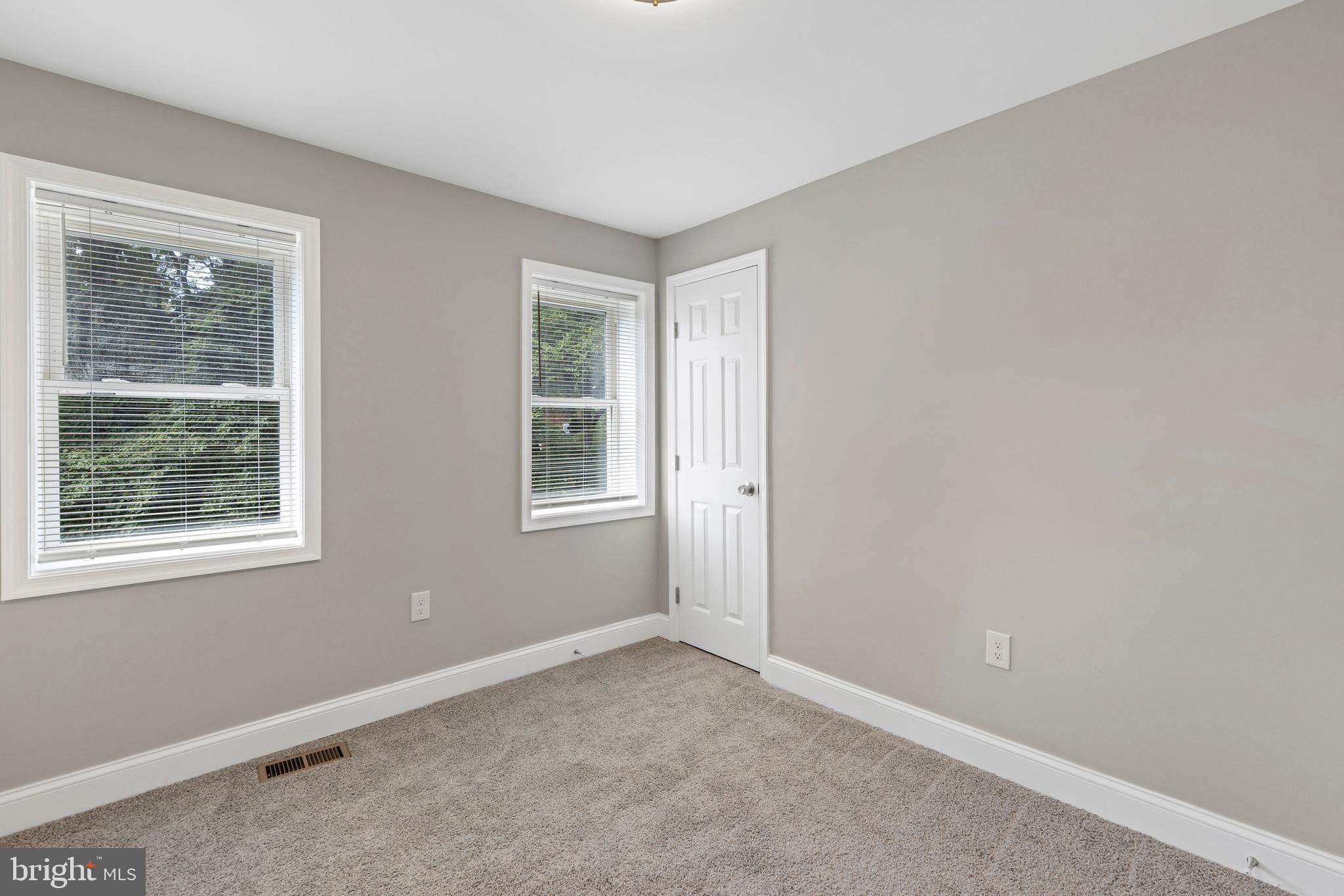 3725 Overview Road Baltimore, MD 21215 - Photo 11 of 17 an empty room with windows