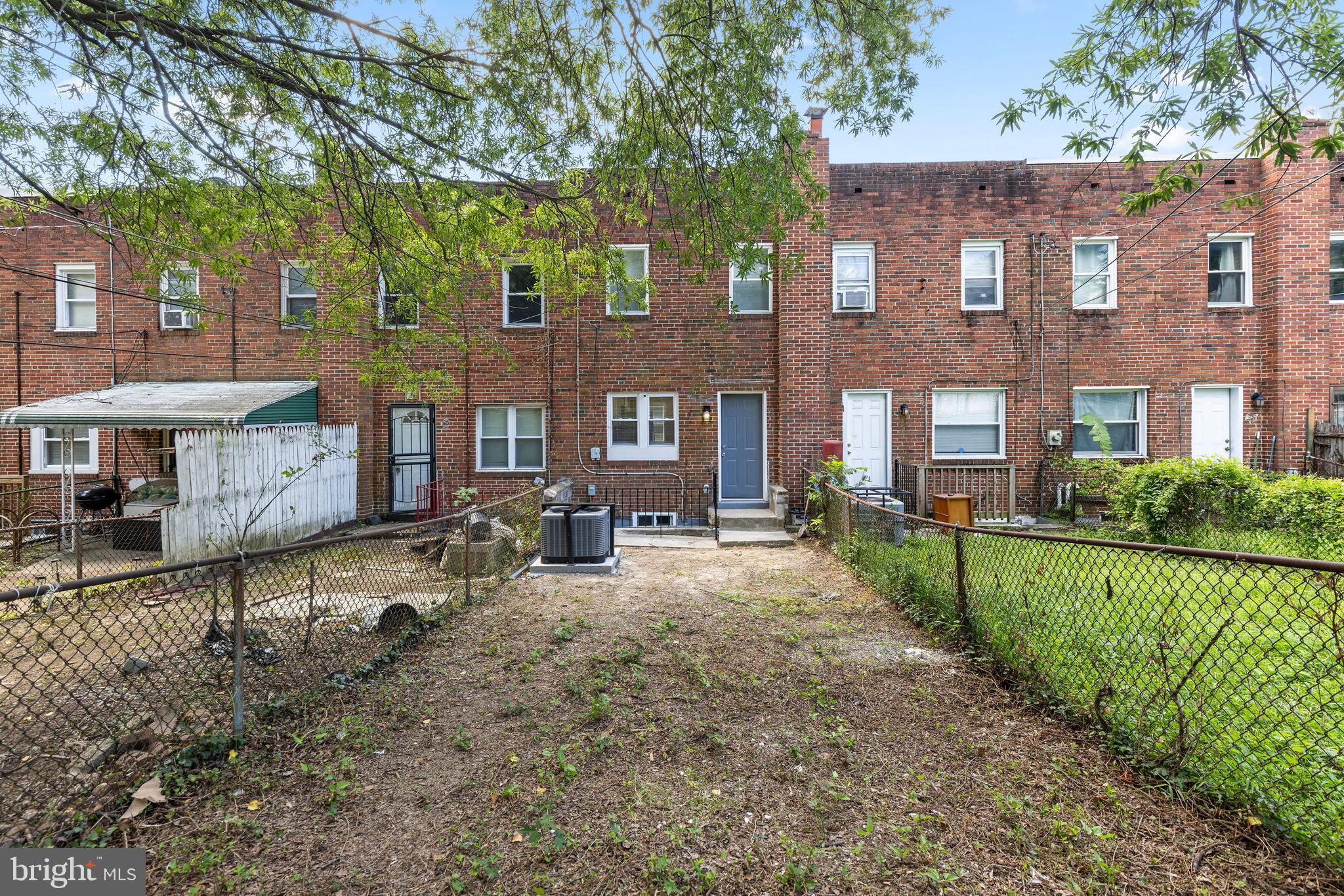 3725 Overview Road Baltimore, MD 21215 - Photo 17 of 17 a view of a house with a yard and sitting area