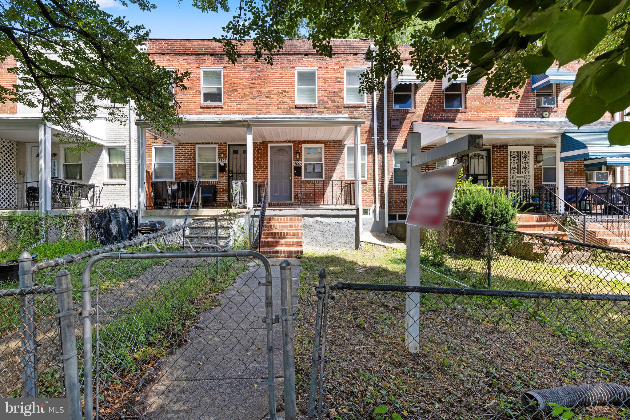 3725 Overview Road Baltimore, MD 21215 - Photo 2 of 17 a view of a house with backyard porch and sitting area