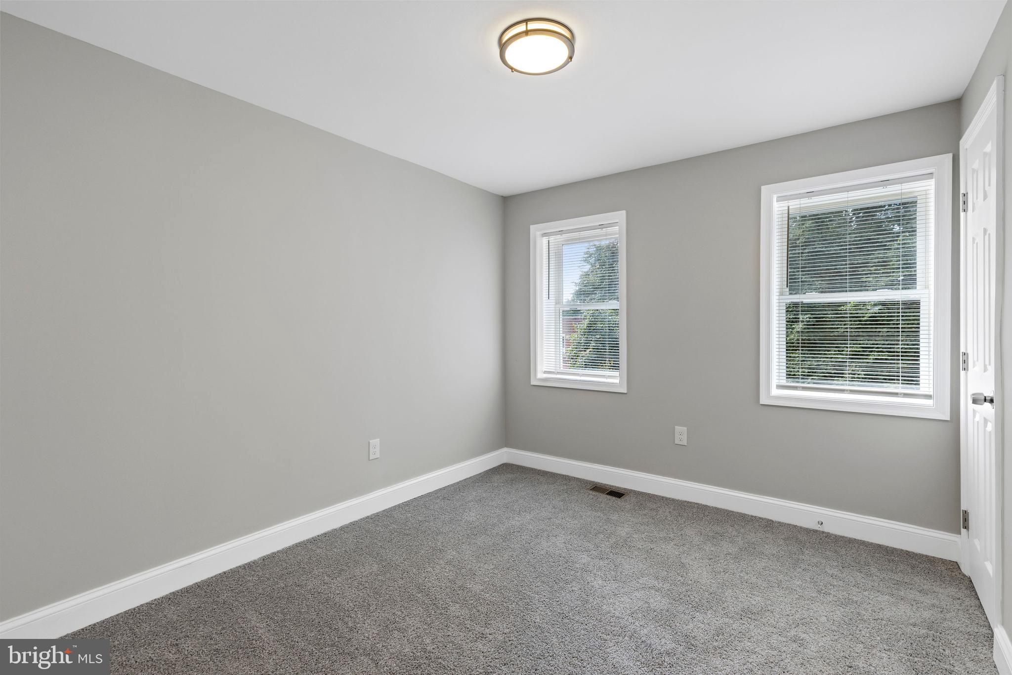 3725 Overview Road Baltimore, MD 21215 - Photo 10 of 17 an empty room with windows