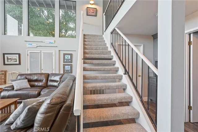 a view of a balcony with wooden fence