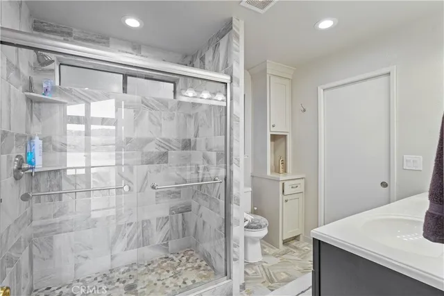 a view of balcony with wooden floor