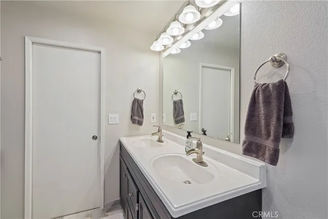 a view of a roof deck with wooden fence