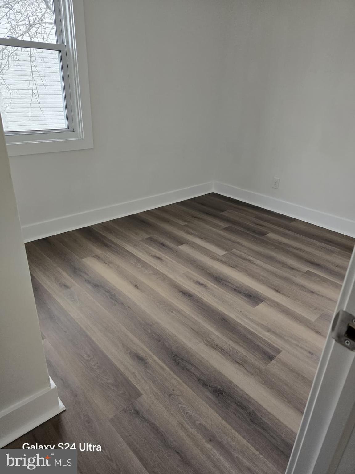 3303 Fairview Road Gwynn Oak, MD 21207 - Photo 6 of 12 a view of empty room with window