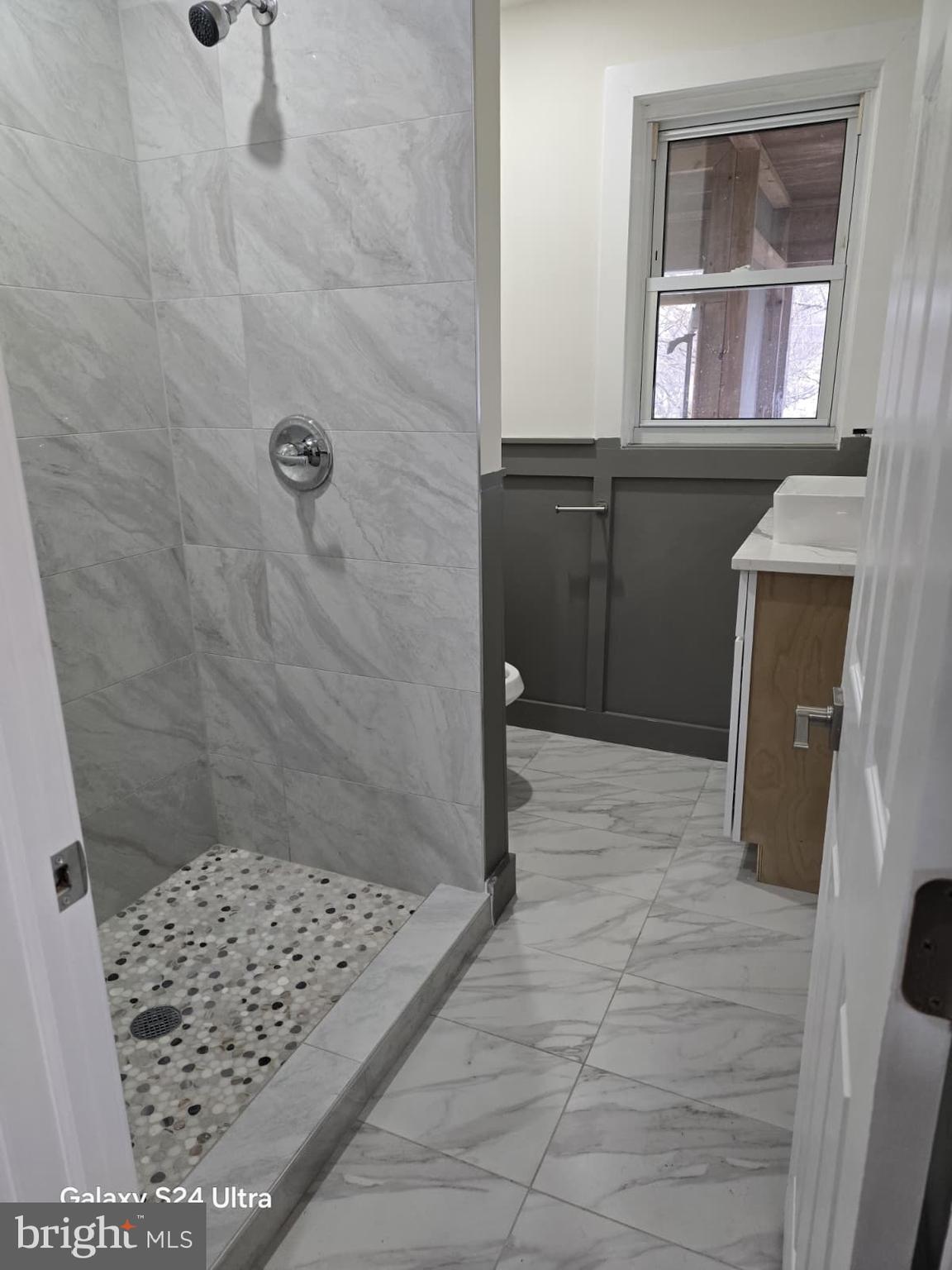 3303 Fairview Road Gwynn Oak, MD 21207 - Photo 9 of 12 a bathroom with a shower