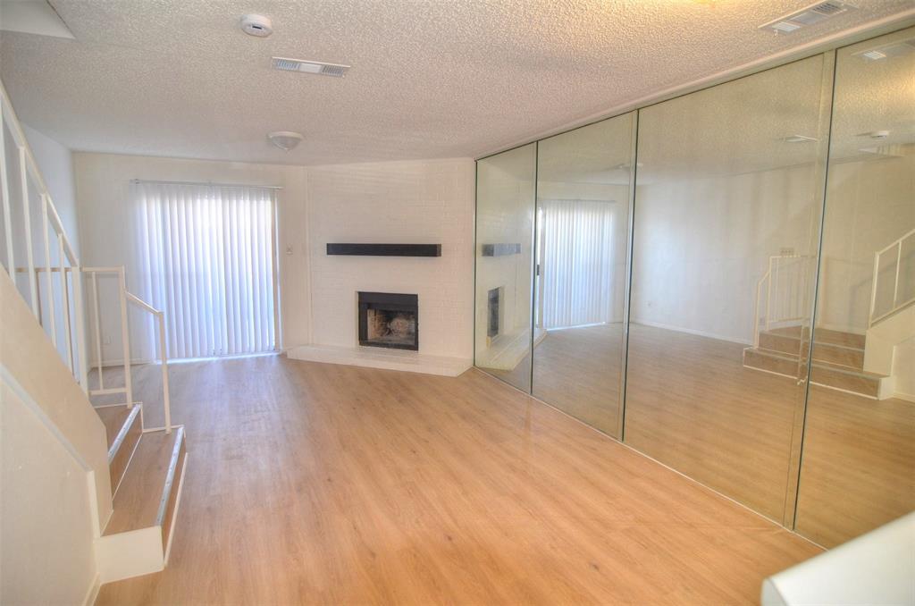 10500 Lake June Road, Unit B07 Dallas, TX 75217 - Photo 3 of 6 a view of livingroom with a fireplace