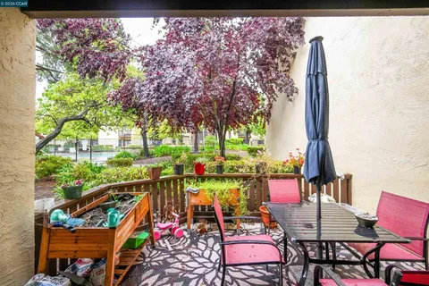 a view of outdoor space with deck and wooden floor