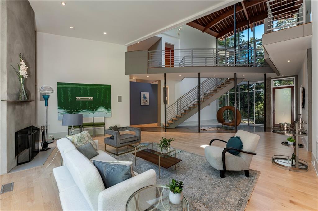 1775 Mt Paran Road Northwest Atlanta, GA 30327 - Photo 11 of 66 a living room with furniture and a flat screen tv