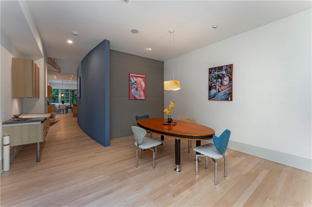 1775 Mt Paran Road Northwest Atlanta, GA 30327 - Photo 17 of 66 a view of a dining room with furniture and wooden floor