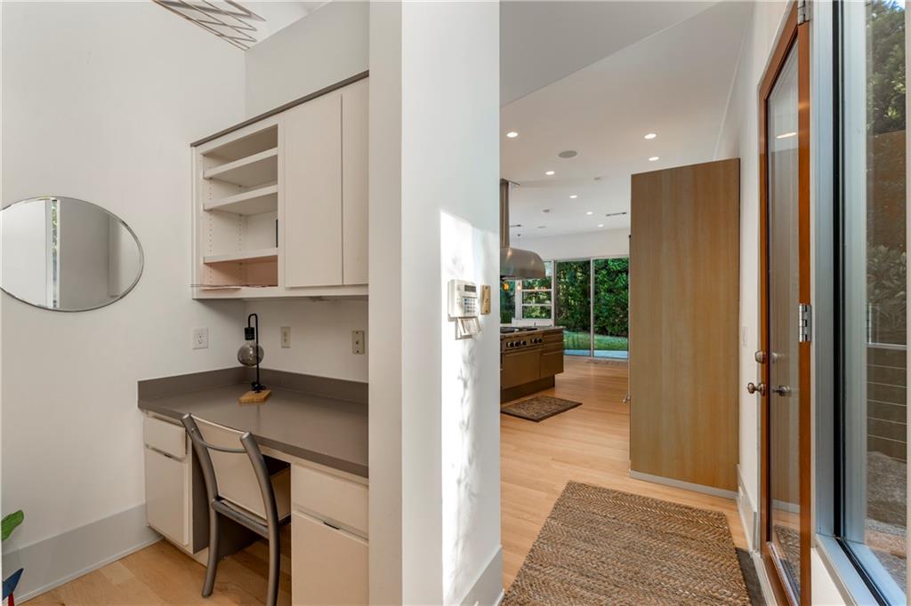1775 Mt Paran Road Northwest Atlanta, GA 30327 - Photo 23 of 66 a bathroom with a sink a mirror and a toilet