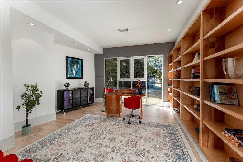 1775 Mt Paran Road Northwest Atlanta, GA 30327 - Photo 26 of 66 a living room with furniture cabinets and potted plant