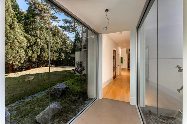 a white toilet sitting next to a bathroom sink