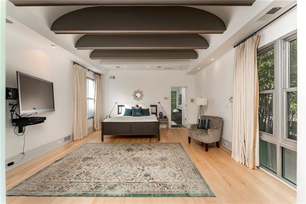 1775 Mt Paran Road Northwest Atlanta, GA 30327 - Photo 30 of 66 a living room with furniture and a flat screen tv