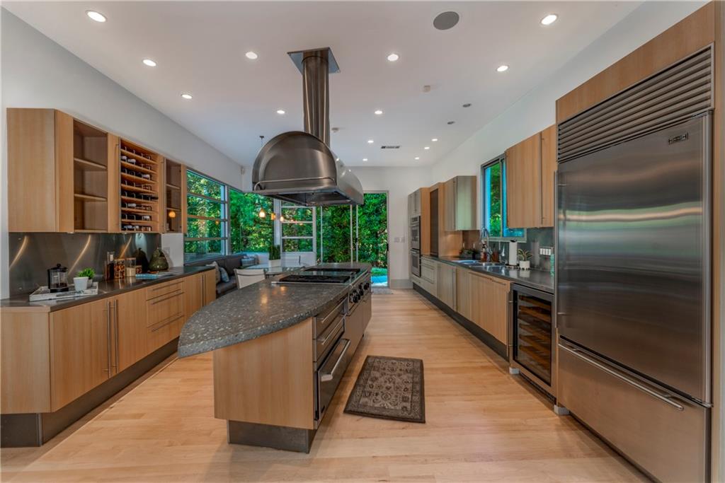 1775 Mt Paran Road Northwest Atlanta, GA 30327 - Photo 3 of 66 a large kitchen with stainless steel appliances kitchen island a large counter top