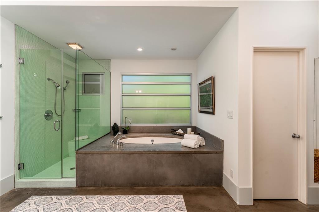 1775 Mt Paran Road Northwest Atlanta, GA 30327 - Photo 34 of 66 a bathroom with a sink a toilet and shower