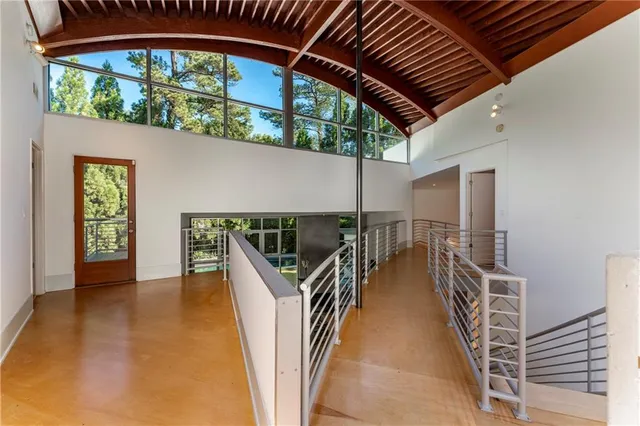 a bathroom with a sink vanity mirror and toilet