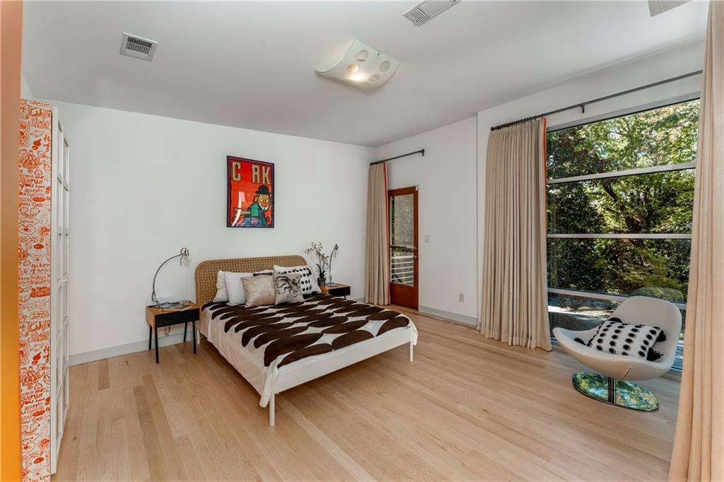 1775 Mt Paran Road Northwest Atlanta, GA 30327 - Photo 42 of 66 a living room with furniture and a large window