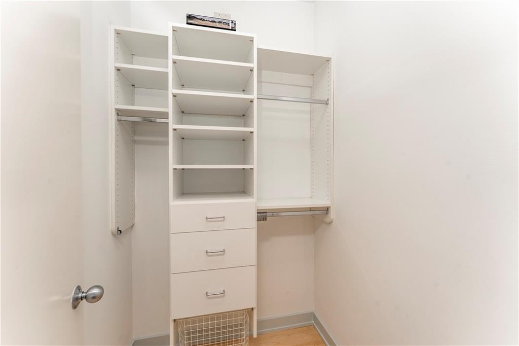 1775 Mt Paran Road Northwest Atlanta, GA 30327 - Photo 49 of 66 a view of walk in closet with empty racks