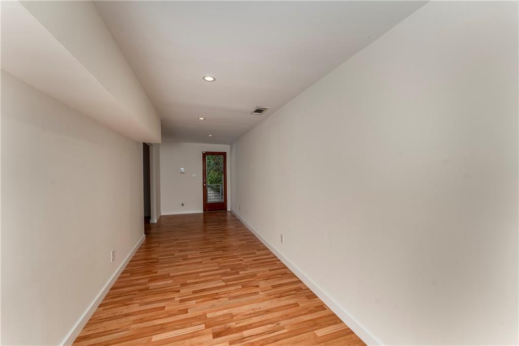 1775 Mt Paran Road Northwest Atlanta, GA 30327 - Photo 56 of 66 a view of a hallway with wooden floor