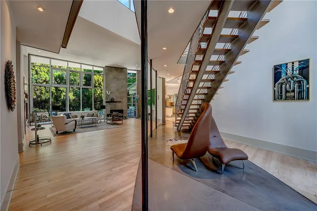 a view of an entryway with wooden floor