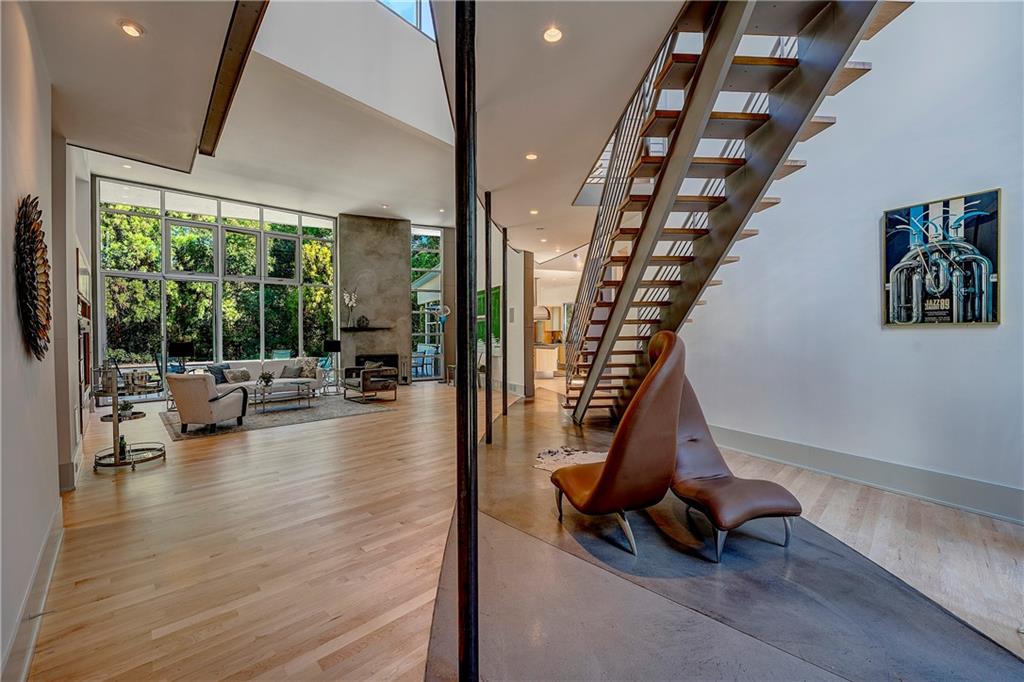 1775 Mt Paran Road Northwest Atlanta, GA 30327 - Photo 7 of 66 a view of hall way with furniture and floor to ceiling window