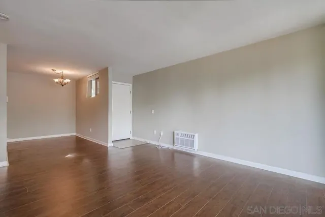 a kitchen with stainless steel appliances granite countertop a refrigerator stove and sink
