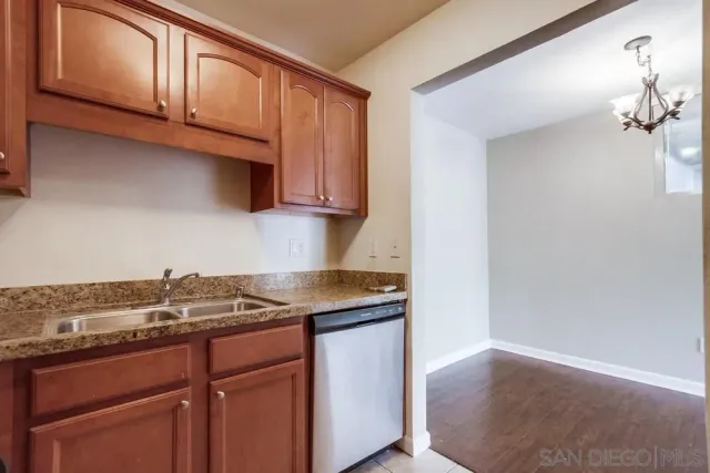 a white refrigerator freezer sitting in a kitchen
