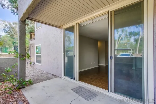 a view of a house with a yard and garage
