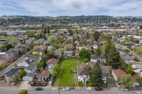 an aerial view of a city with lots of residential buildings