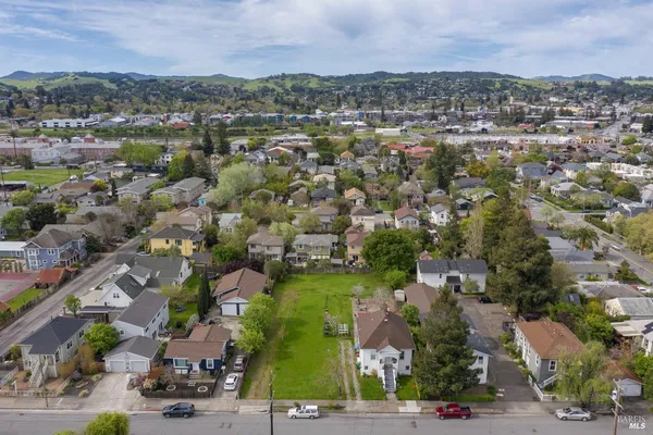 an aerial view of a city with lots of residential buildings