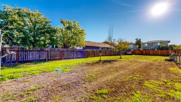 a swimming pool with wooden fence