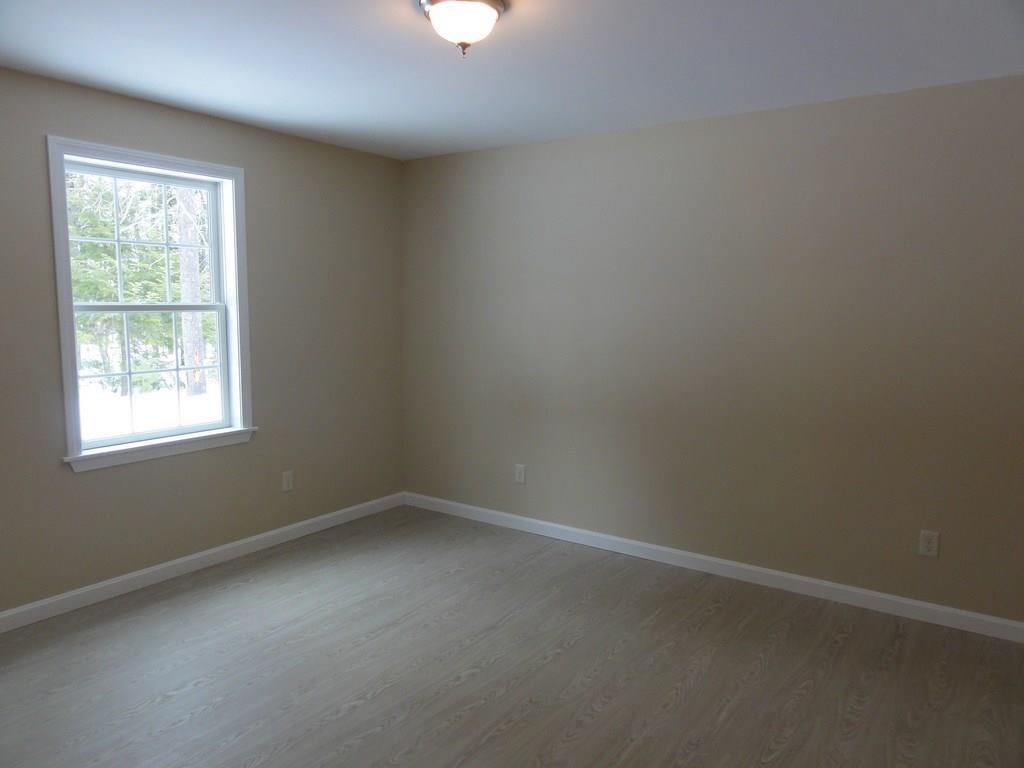 9 West Road Belgrade, ME 04917 - Photo 11 of 16 Large bedroom.