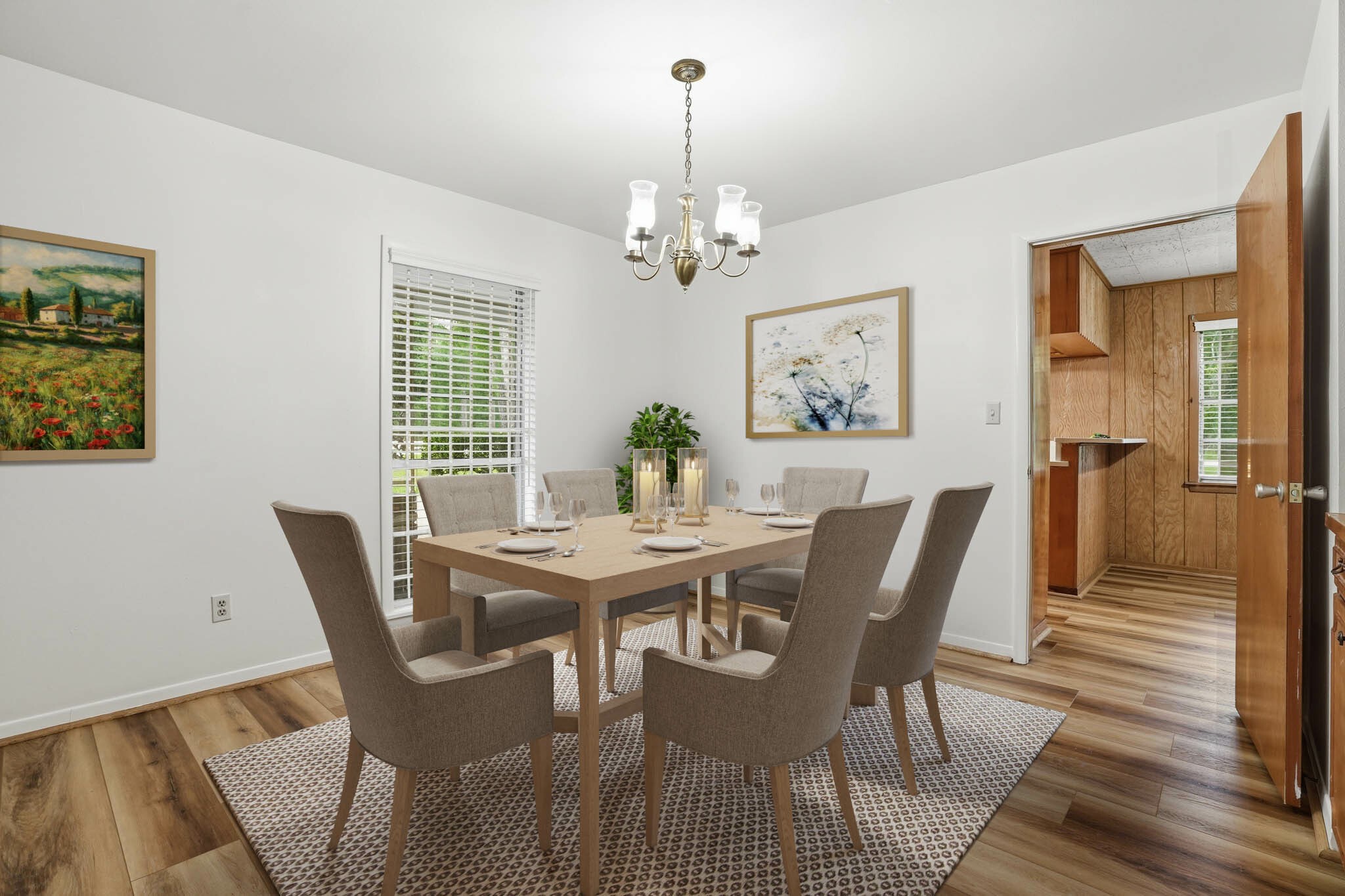 10240 Post Oak Drive Conroe, TX 77385 - Photo 12 of 46 a view of a dining room with furniture a chandelier and wooden floor