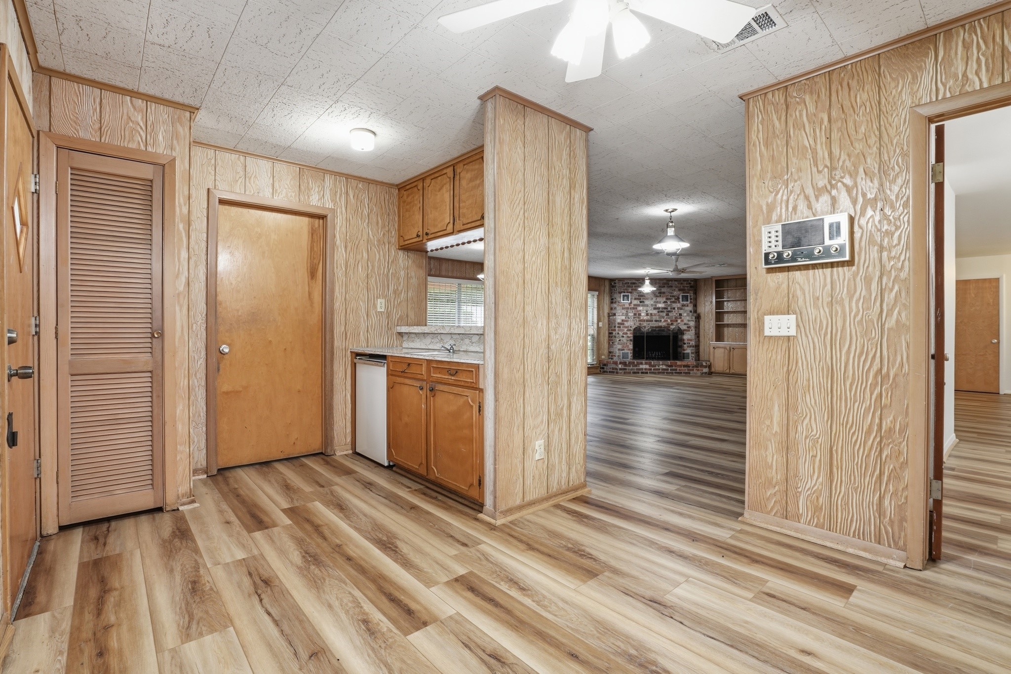 10240 Post Oak Drive Conroe, TX 77385 - Photo 15 of 46 a view of a hallway with wooden floor