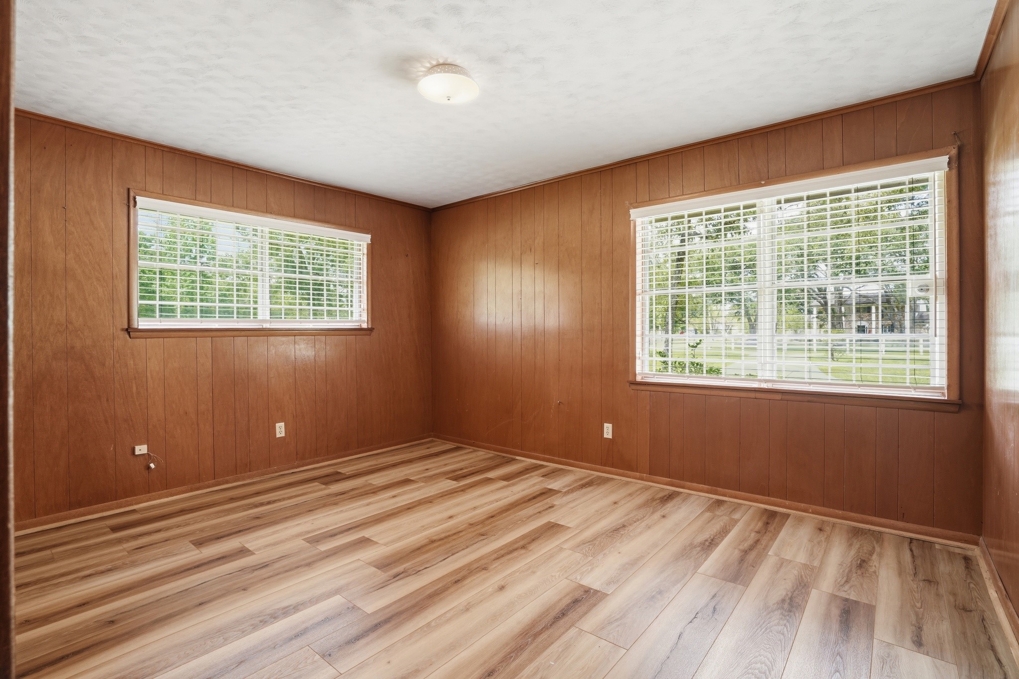 10240 Post Oak Drive Conroe, TX 77385 - Photo 29 of 46 a view of room with window and hardwood floor