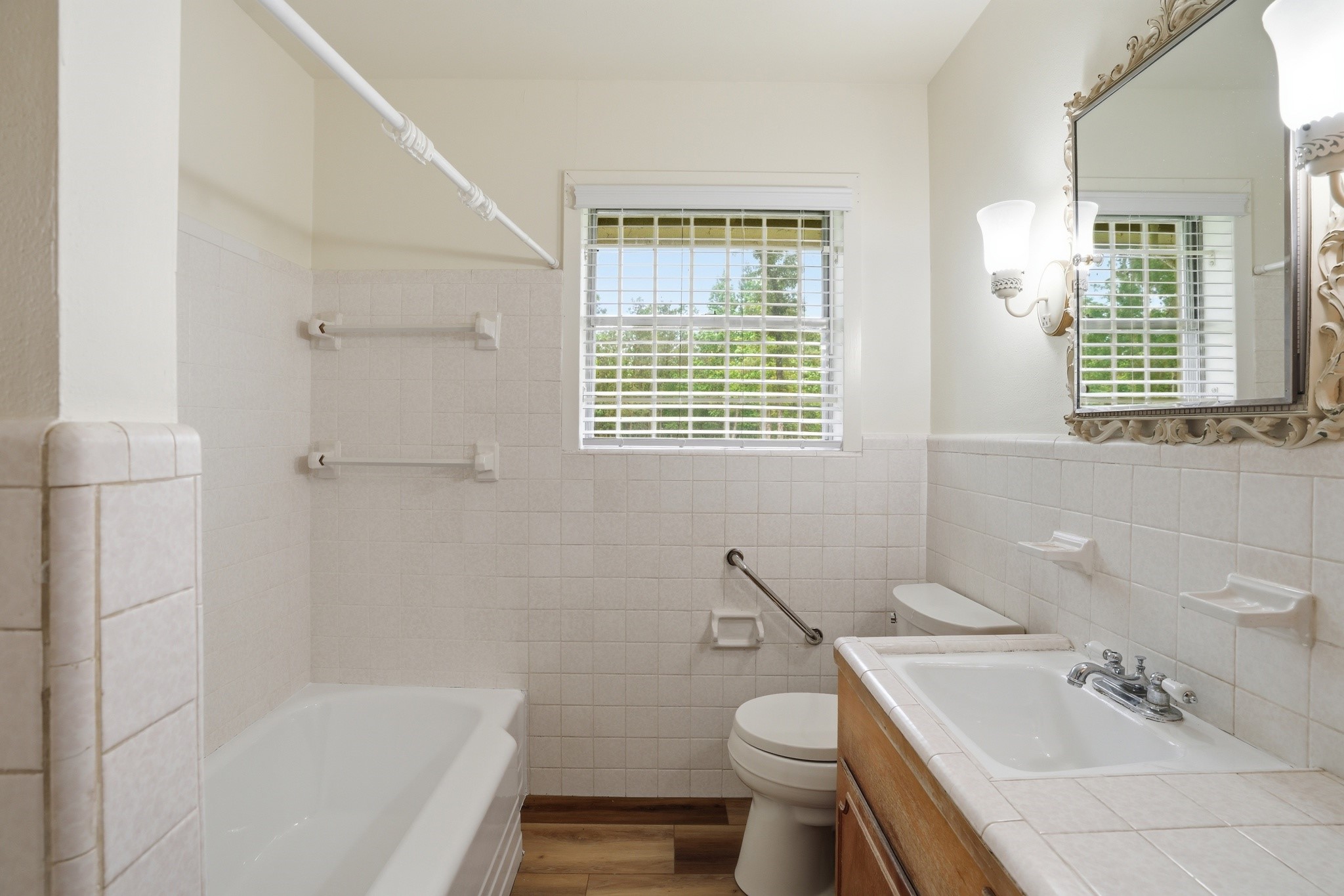 10240 Post Oak Drive Conroe, TX 77385 - Photo 37 of 46 a bathroom with a sink toilet and shower